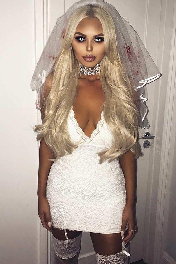hot zombie bride for halloween with a white veil 